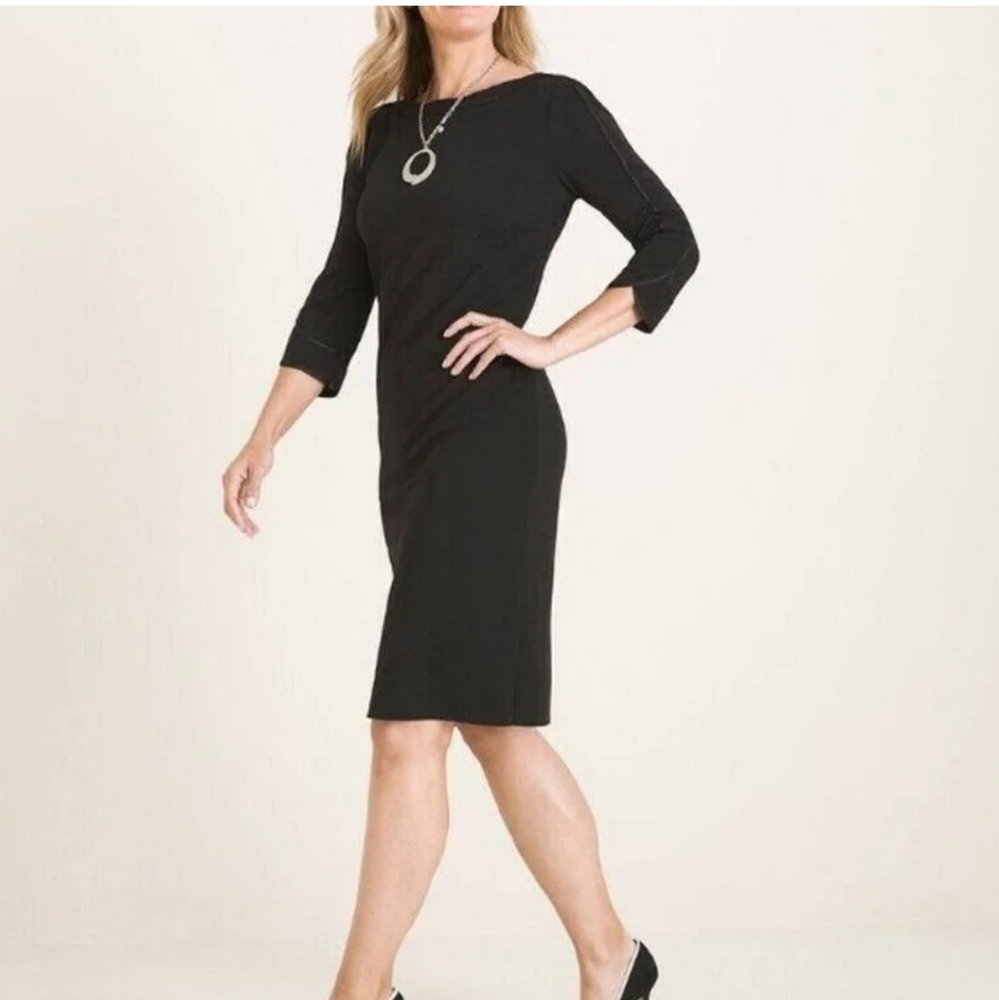 Classic black above the knee dress.